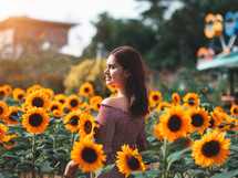 a teen girl with braces in a field of sunflowers 