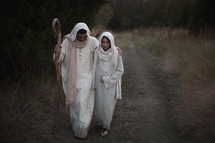 Joseph and Mary walking towards Bethlehem 