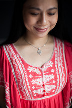 Asian woman looking down 