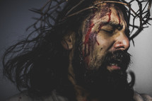 blood on the face of Christ