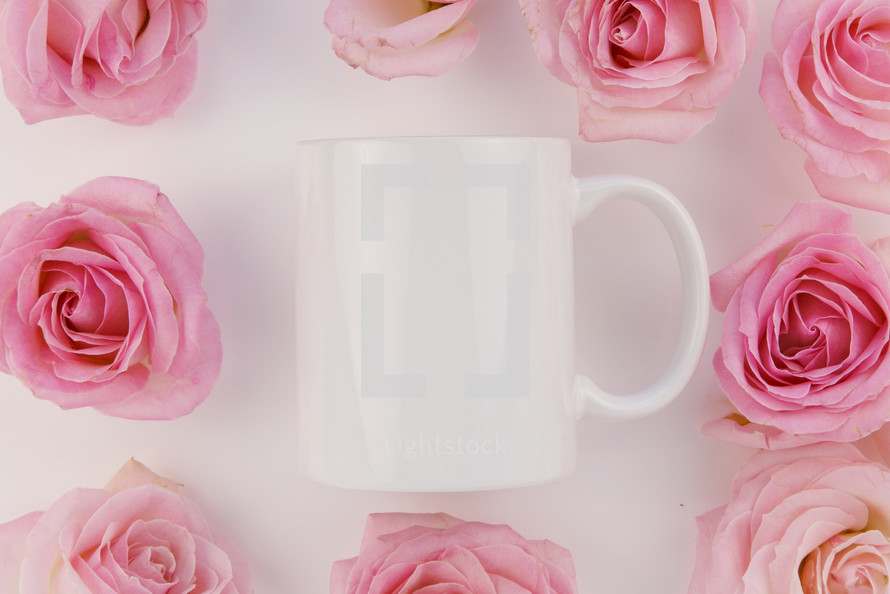 pink roses and coffee mug 