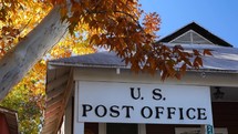 A small town post office with fall colors