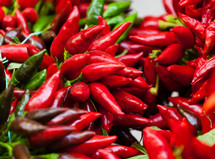 Big bunch of red hot chili pepper at outdoors market