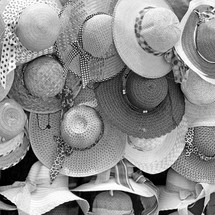 straw hats at a market 
