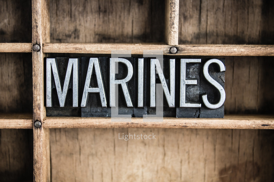 word marines on a shelf 