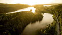 Aerial shot of landscape among the lakes at sunrise in Scandinavia