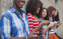 teens on their cellphones
