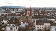 Basel Minster (Munster), Switzerland , Reformed Protestant church. Aerial cityscape pullback