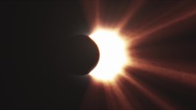 Sun rays of light, moon covering the sun during Total Solar Eclipse	