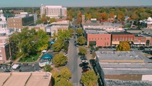 aerial view over a small town downtown area 