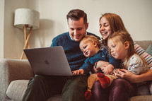 family watching an online worship service 