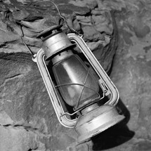 old lantern on a rock 