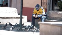 man resting on a bench in Mexico 