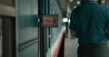 Inside the train station, people were bustling
