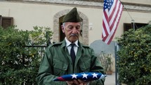 Veteran Second World War With The American Flag Folded As A Sign Of Mourning