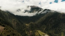 Cloud Canopy Over Tungurahua Volcano Near Town Of Baños In Ecuador. Aerial Shot	