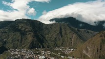 Beautiful Cloudscape Over Tungurahua Volcano And Andean Mountains In Banos, Ecuador. Aerial Wide Shot	