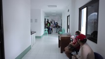Hospital Hallway People Waiting For Treatment