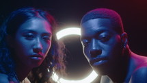 Young Beautiful Couple in Neon Lights