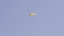 Paraglider in sky