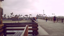 time-lapse of people on a pier in Newport Beach 