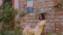 Woman reading in the streets of Italy