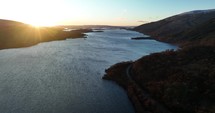 Drone footage of Loch Lomond in Scotland at sunrise.