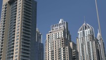 Buildings, skyscrapers, construction work in middle eastern city of Dubai in United Arab Emirates. Dubai skyline, cityscape.