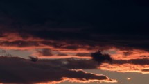 Timelapse of dark clouds in evening sky