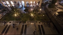Timelapse of people on central city square at night, Thessaloniki