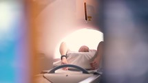 Patient being moved out of MRI machine