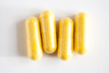 yellow capsules