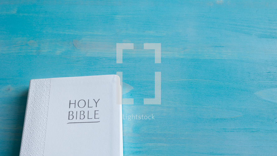 Bible on blue background 