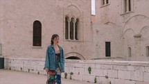 Girl walking in the streets of Italy