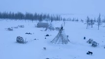  aerial view of a remote winter camp in the siberian wilderness 4k drone shot