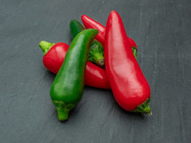 Red and Green Chilies on a Slate