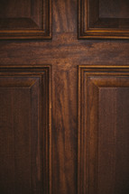 Paneled wooden door.