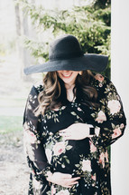 pregnant woman in a floral dress 