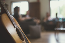 guitar and young adult Bible study group 