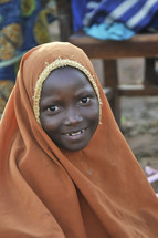 Sundanese Muslim shrouded girl smiling
