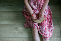 girls reading from old Bibles 