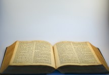 An open Bible. 