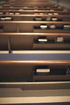 liturgy books in the back of church pews