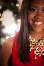 A smiling African-American woman at Christmas 