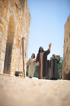 woman at the well - Jesus and his disciples walk through town 