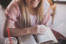 woman reading a a Bible