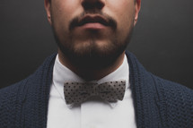 closeup up of a man's neck in a bow tie 