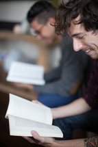 men reading at a Bible study 