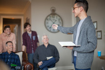 man leading a discussion at a Bible study 