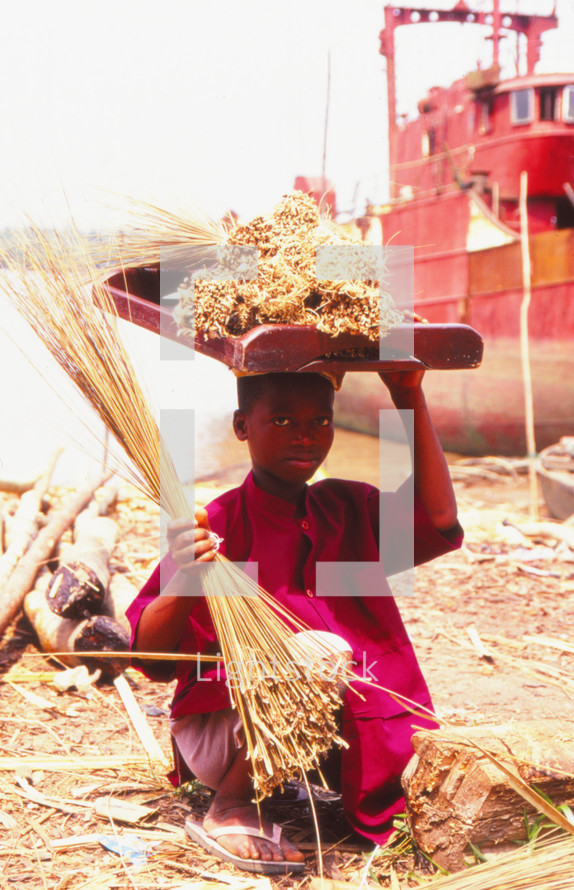 a child harvesting wheat 